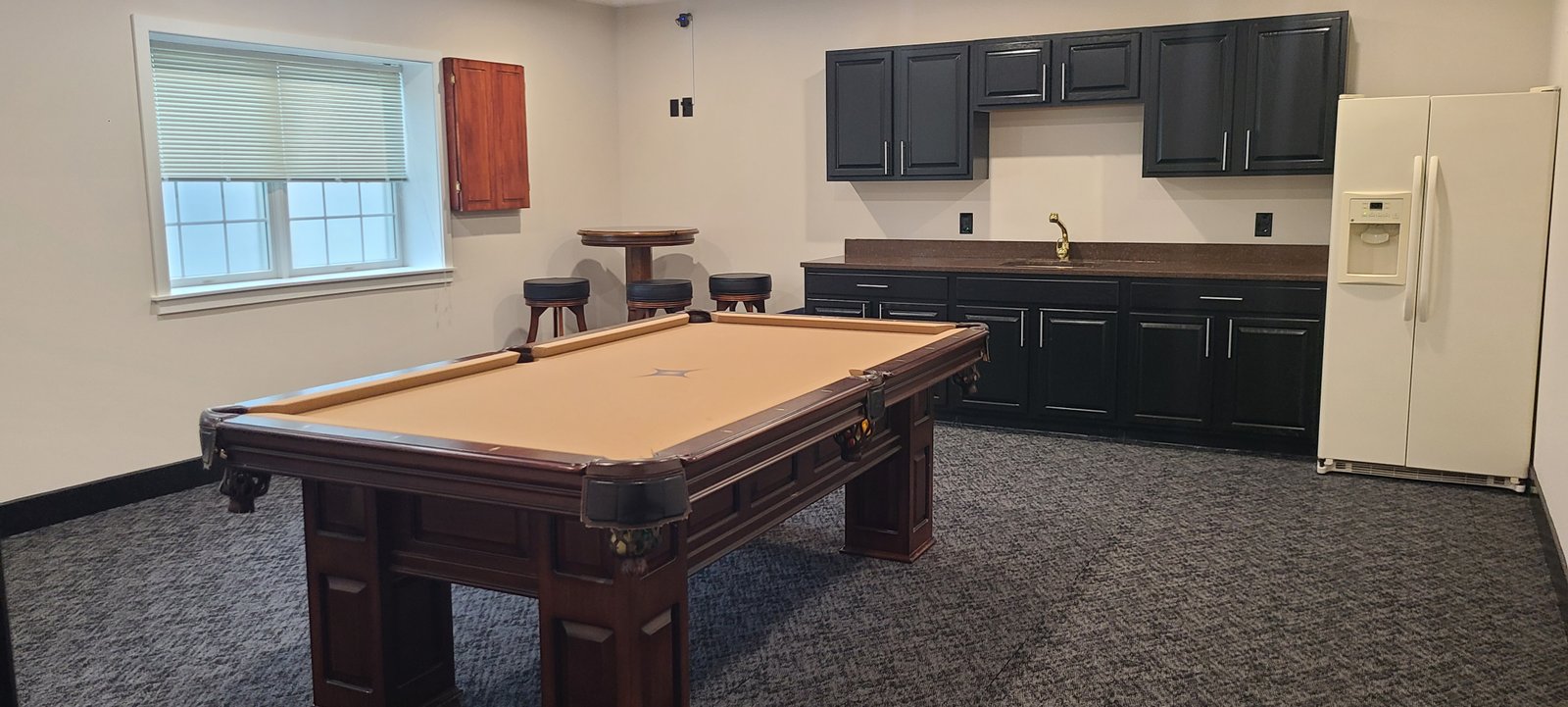 Kitchen and break room with billiards table
